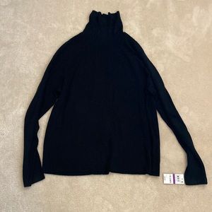Thin black turtleneck sweater